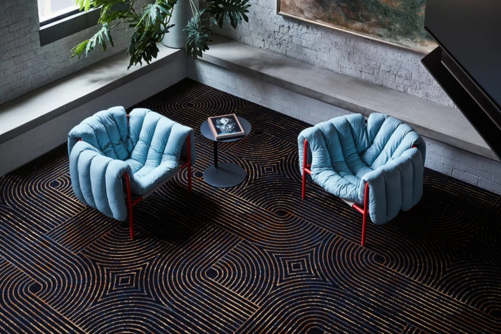 Encore woven carpet in Metropolis installed in a room