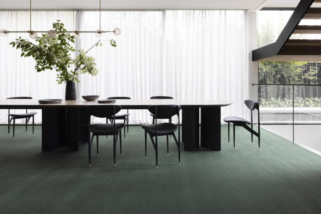 Era woven carpet in Year installed in a room