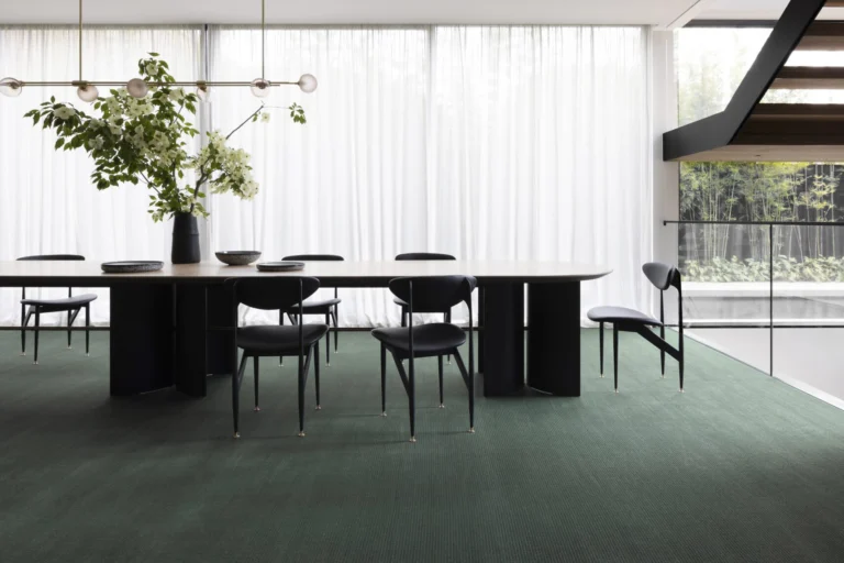 Era woven carpet in Year installed in a room