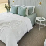 Nobby wool carpet in Pepita installed in a room