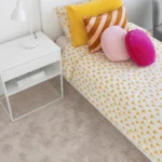 Scarlet nylon carpet in Amaryllis installed in a room