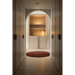 Score woven carpet in Berceuse installed in a room