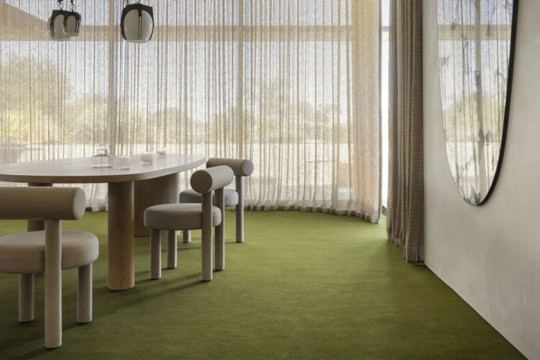 Score woven carpet in Coda installed in a room