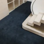 Score woven carpet in Strophic installed in a room